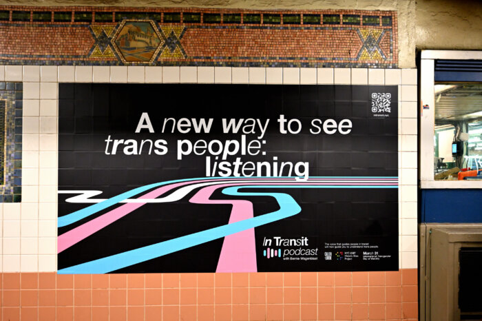 The campaign also features posters on the wall in the station.