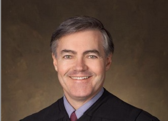 US District Judge John A. Woodcock, Jr.