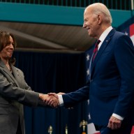 Vice President Kamala Harris, left, shakes hands with President Joe Biden, right, after introducing him at a campaign event in Raleigh, N.C., Tuesday, March 26, 2024.