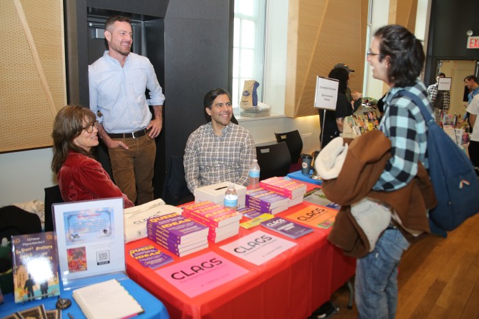 Staff of CUNY CLAGS, one of the event sponsors, at the Rainbow Book Fair in New York on Saturday, April 20, 2024.