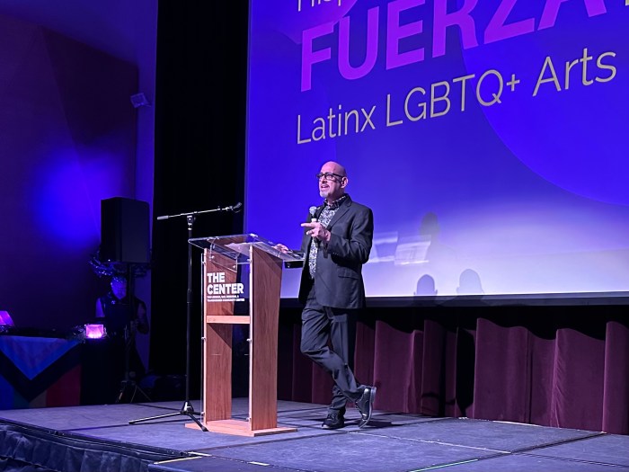 Fuerza Fest's organizer, Mario Colon, delivers remarks.