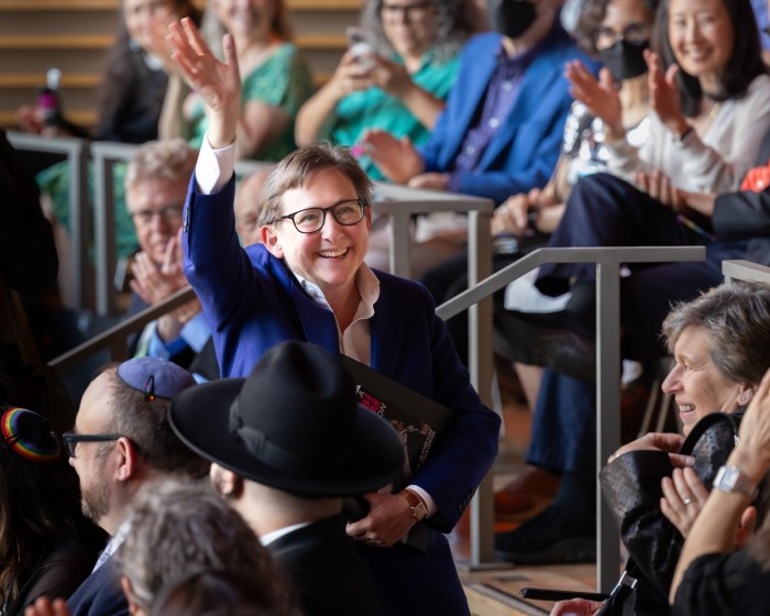 Kleinbaum waves to the crowd during a celebration of her career.