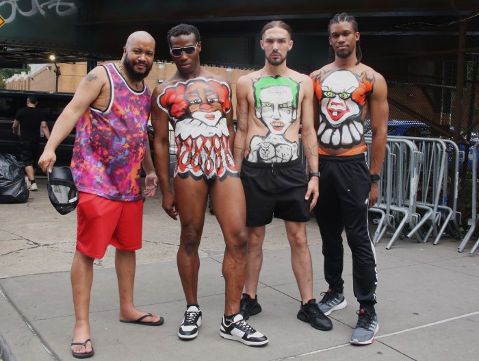 Body painter and artist Charly Dominguez, left, poses with some models at Da Bronx Pride Festival.