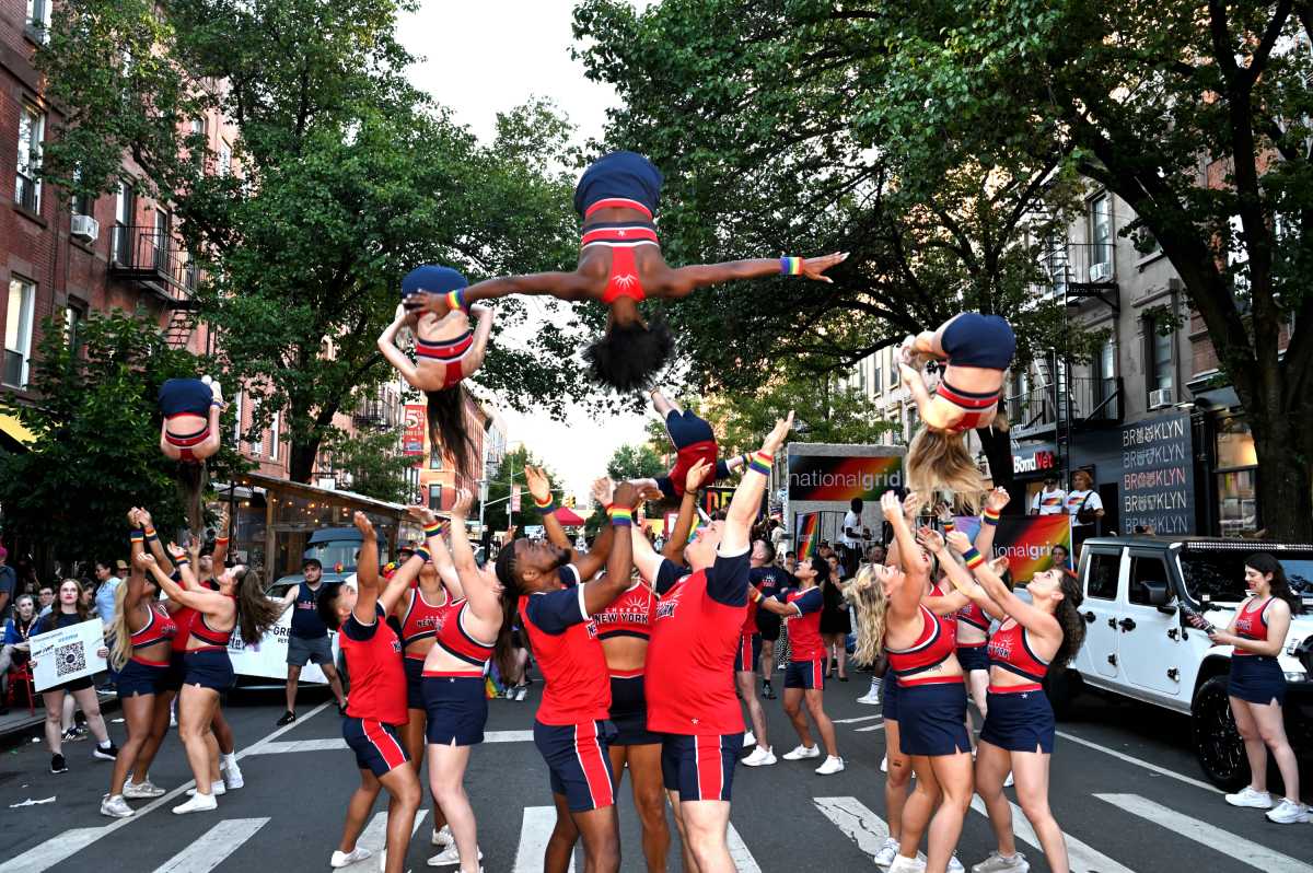 Gotham Cheer performs during Brooklyn Pride's 2024 twilight march.