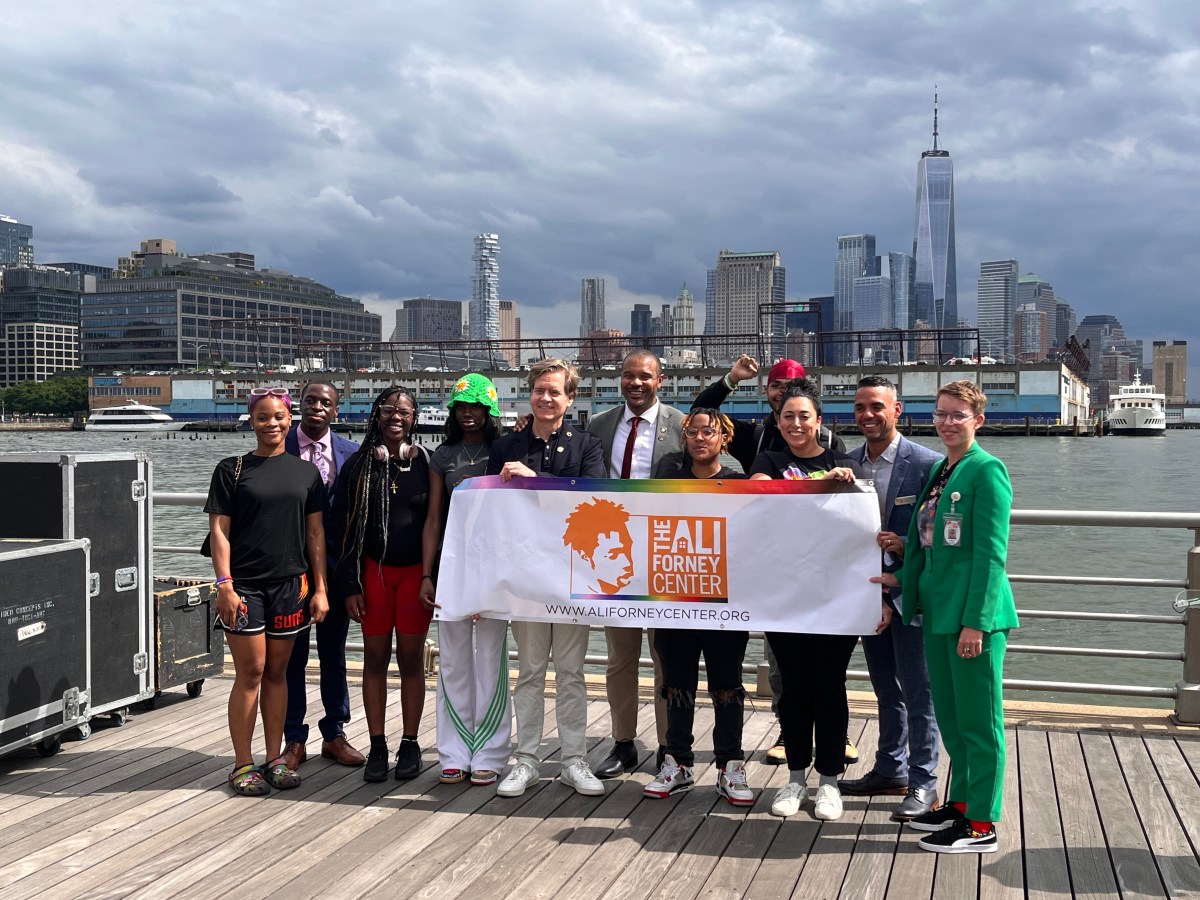 Representatives from the Ali Forney Center with State Senators Hoylman-Sigal and Brisport at Christopher Street Pier on June 11.