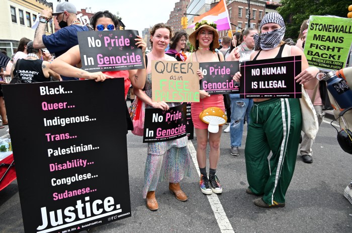 The Queer Liberation March's signs show the themes of this year's march.