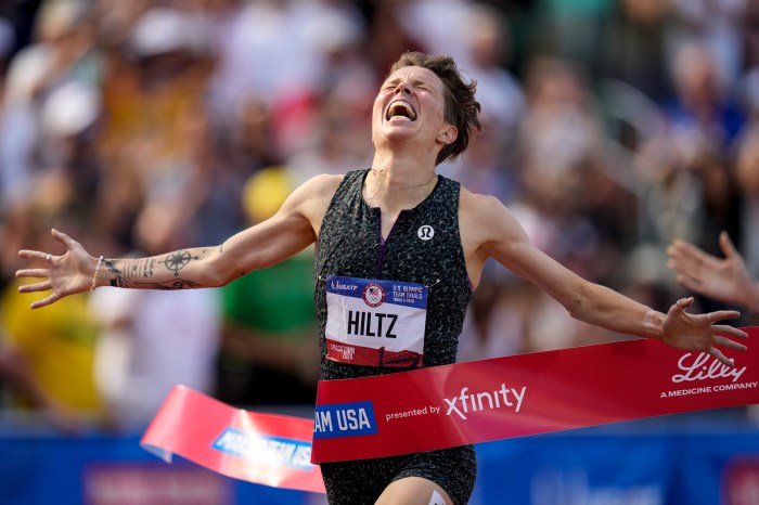 Nikki Hiltz celebrates after winning the women's 1500-meter final during the U.S. Track and Field Olympic Team Trials, Sunday, June 30, 2024, in Eugene, Ore.