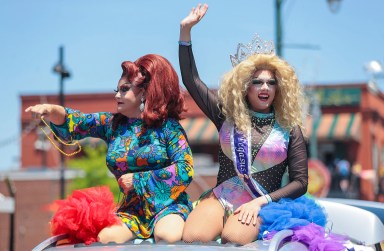 Pageant winners throw out beads during the Memphis PRIDE Festival & Parade, June 4, 2022, in Memphis, Tenn.