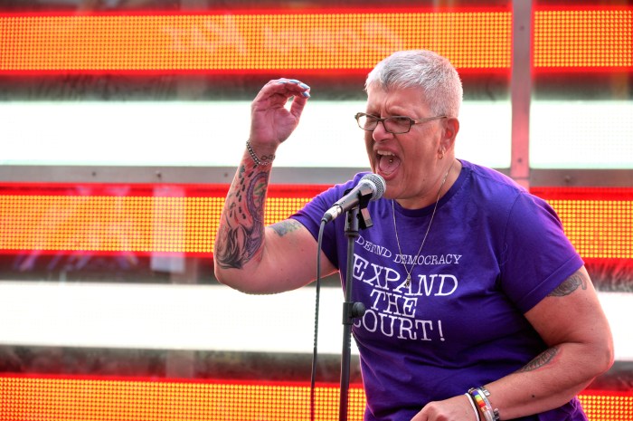 Cathy Marino-Thomas dons a shirt calling for the Supreme Court to be expanded.