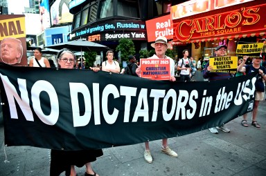 Activists denounce Project 2025 and the campaign's threats to democracy during a Times Square demonstration on July 27.