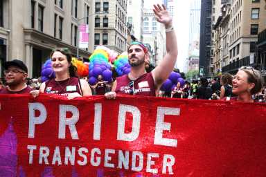 Heritage of Pride's banner leads the 2024 NYC Pride march.