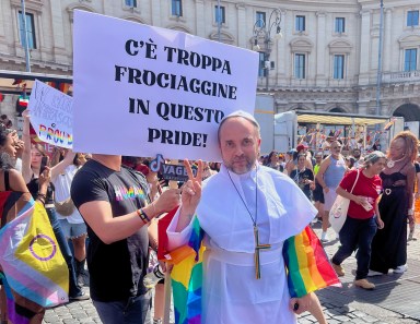 A person dressed up as the Pope at Rome Pride.