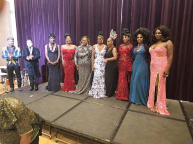 Individuals compete in NYC Black Pride's Mr. and Miss International Pageant.