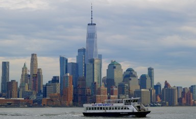 A view of the lower Manhattan skyline on a cloudy overcast day.