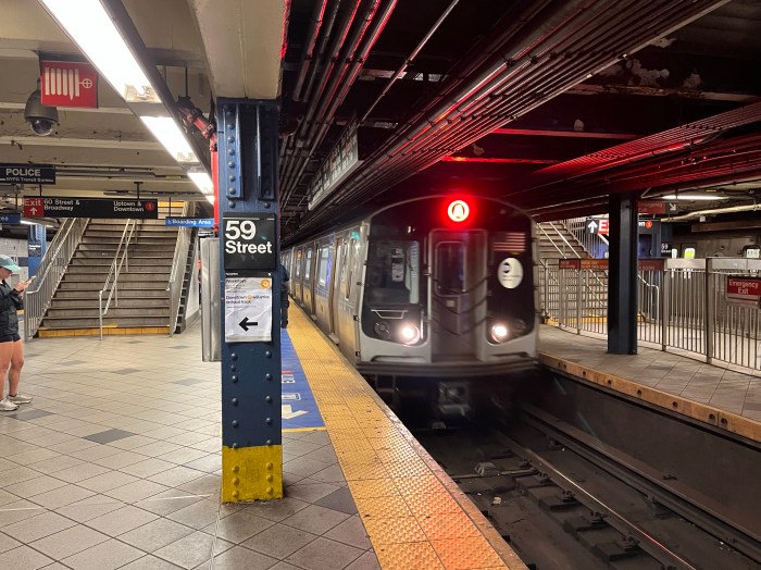 An A Train pulls into the station at 59th Street-Columbus Circle.