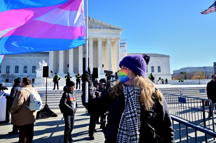 The Trans Flag stands tall outside of the US Supreme Court on Dec. 4.