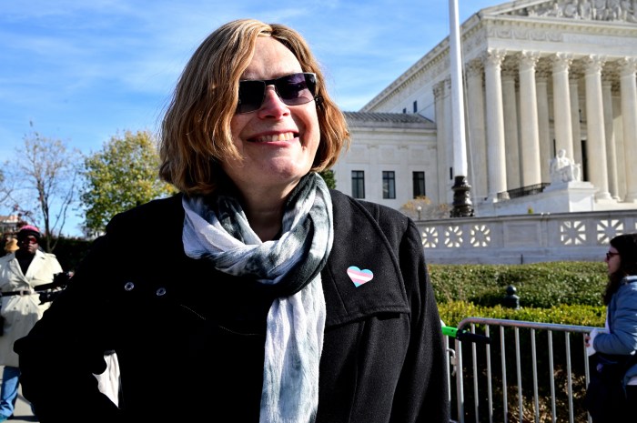 Lilly Wachowski, a film director, joins the rally.