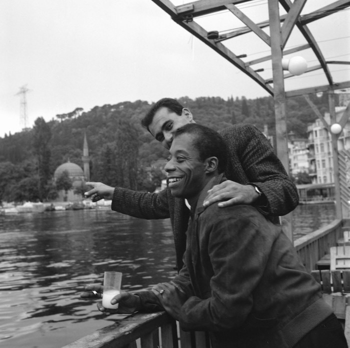 Baldwin and Emin (Baldwin's swimming teacher and lover) at restaurant along the Bosphorus, 1965