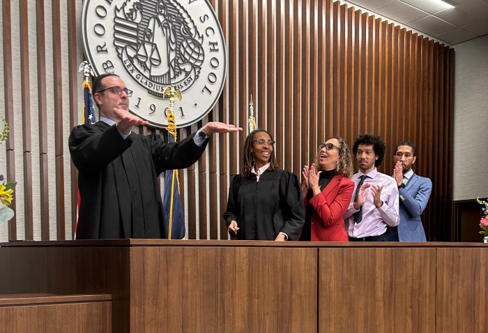 Family members cheer on Judge Jennings to celebrate her swearing-in ceremony.