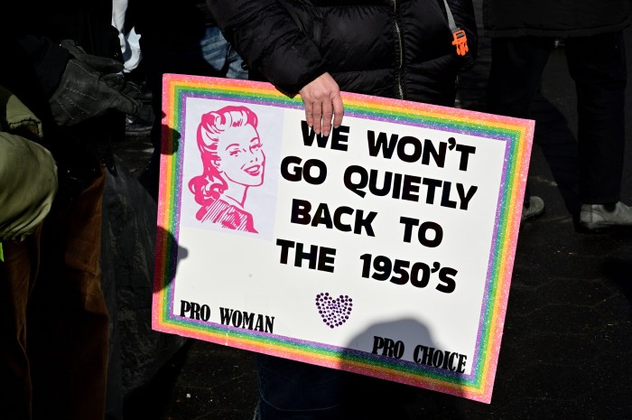 A sign of the times along Sixth Ave. at the People's March on Jan. 18.