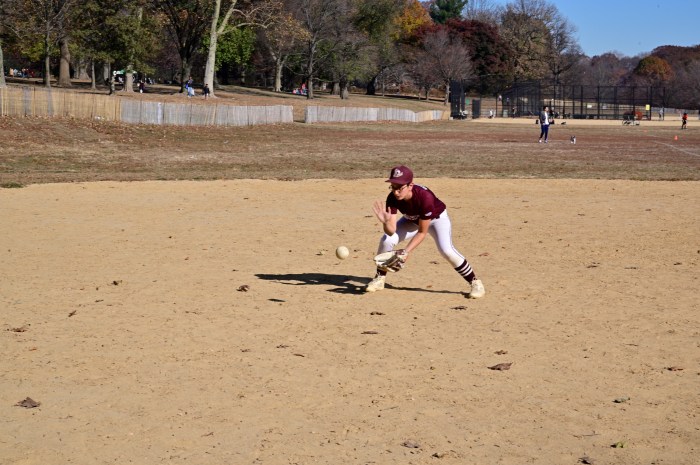 Neela Wickremesinghe fields a ground ball.