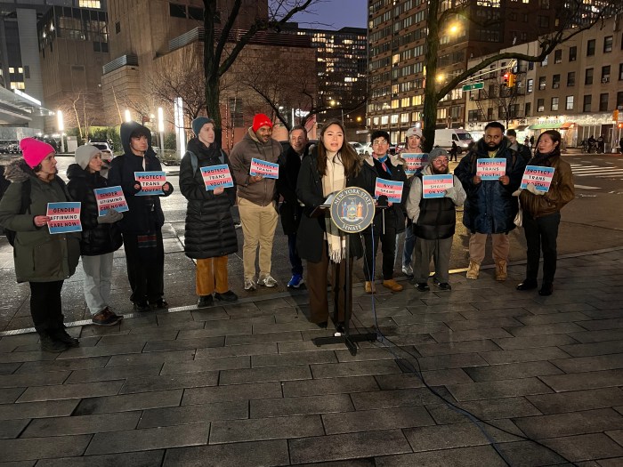 State Senator Kristen Gonzalez, flanked by other elected officials and advocates, delivers remarks at a Feb. 6 press conference near NYU Langone.