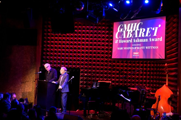 Awardees Marc Shaiman and Scott Whitman share the stage.