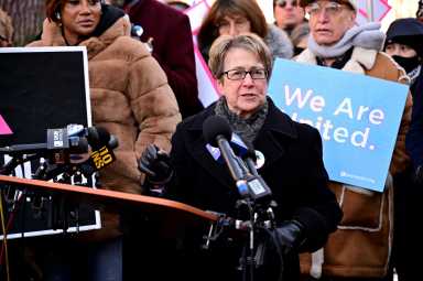 Assemblymember Deborah Glick, the first out member of the State Legislature, addresses the crowd during a protest near the Stonewall Inn in February of 2025.