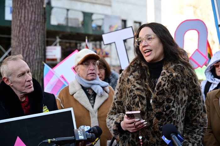 Angelica Christina, a Stonewall Inn Gives Back Initiative board member, addresses the crowd.