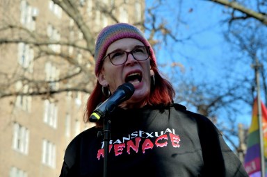 Denise Norris, Menace co-founder, speaks at a demonstration near the Stonewall Inn on Feb. 21.