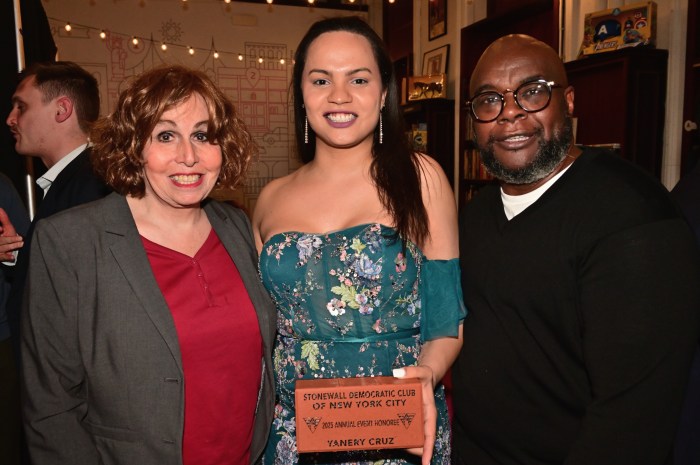 Stonewall board member Melissa Sklarz with awardees Yanery Cruz and Sean Coleman.