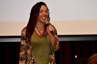 Linda La performs two spoken word pieces during a Transgender Day of Visibility event at The Center on March 28.