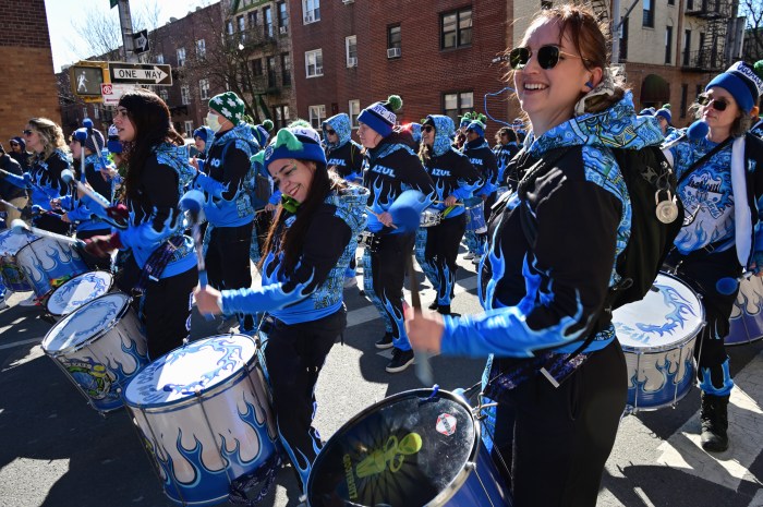 Fogo Azul drums through the parade route.