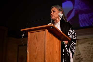 Ivy Kwan Arce delivers remarks at a memorial service for Dr. Joseph Sonnabend.
