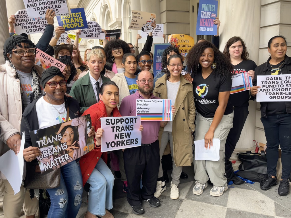 Advocates gather at City Hall on May 22 to call for $35 million in the city budget to support trans New Yorkers.