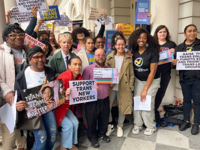 Advocates gather at City Hall on May 22 to call for $35 million in the city budget to support trans New Yorkers.