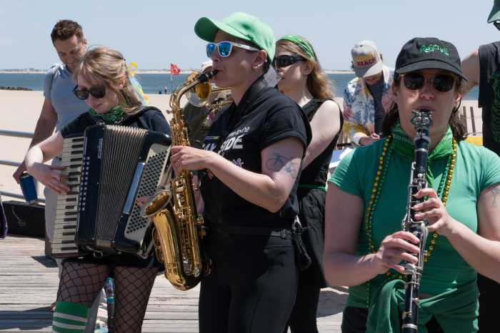 Rude Mechanical Orchestra performs along the boardwalk.