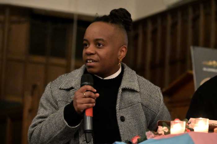 New Pride Agenda's interim executive director, Kei Williams, delivers remarks at a vigil for Sam Nordquist on Feb. 21.