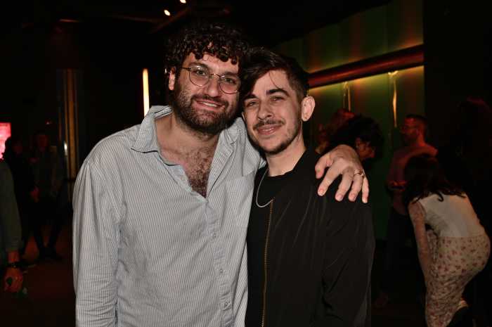 Activist Adam Eli with Strangio.