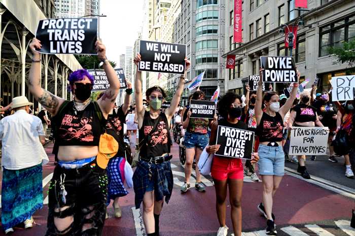 Marchers proceed along Fifth Avenue during the 2025 NYC Dyke March.