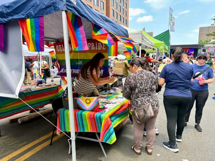 Organizations, food trucks, and local vendors set up tents at the Bronx Pride Festival on Saturday with rainbow themed Pride swag, resource pamphlets and games with prizes.