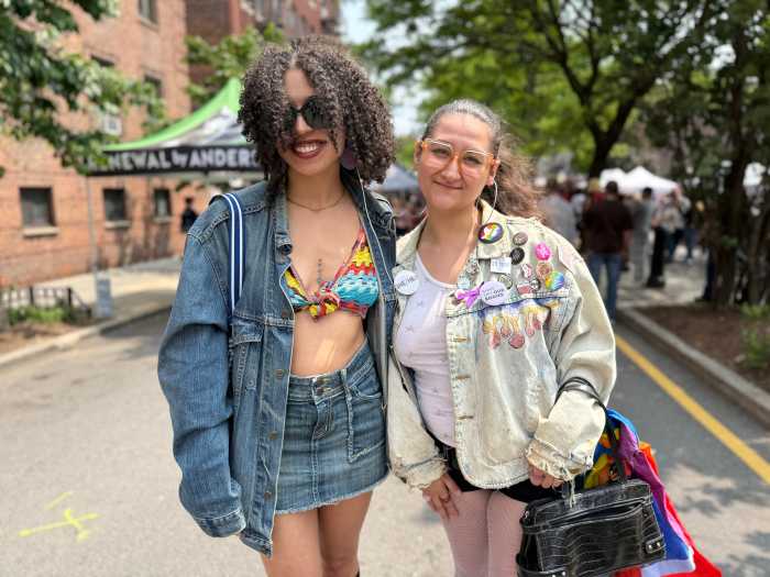 Erica, 26, and her friend, Sydney, 24, enjoy Queens Pride.