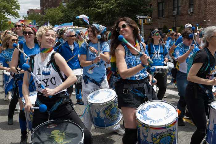 Members of Fogo Azul are all smiles during the parade.
