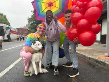Zack Reedy, Danielle Jackson, and David Echevarria share a moment at Brooklyn Pride.