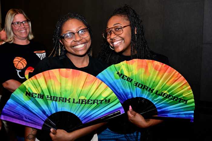 It wouldn't be Pride night without some rainbow fans!