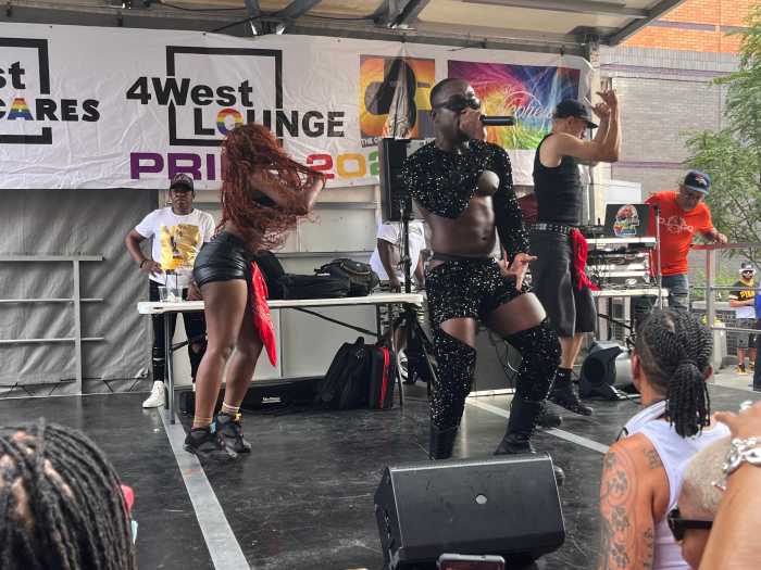 4N Yardi leads an on-stage performance during the block party.