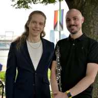 The Queer Urban Orchestra's artistic director and conductor David Bloom and general manager Brian Shaw.