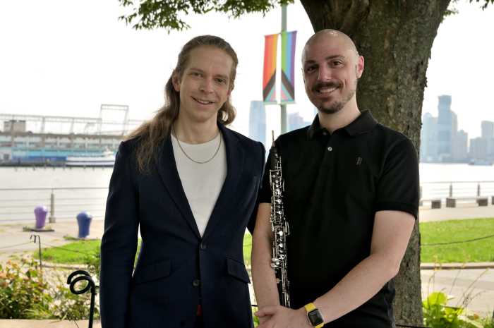 The Queer Urban Orchestra's artistic director and conductor David Bloom and general manager Brian Shaw.