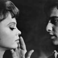 A man and a woman's faces are close together in a black and white scene in “Who Killed Teddy Bear," directed by Joseph Cates, opens Aug. 8 at the Film Forum.