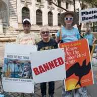 Marilyn Oliva, Roberta Degnore, and Anne Maguire stand together against book bans.